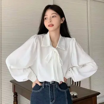 Блузка с рукавами-фонариками Осень 2023 Корейская версия Бант Дизайн Чувство темперамента Ношение белой блузки с длинным рукавом Топ для женщин
